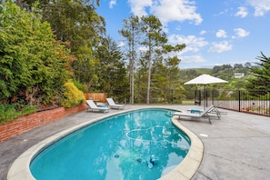 Relax by your beautiful private heated pool and enjoy the expansive canyon views