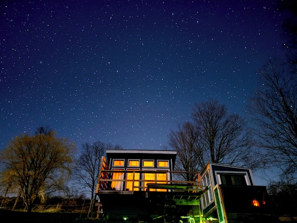 Night sky above the off-grid glamping cabin.