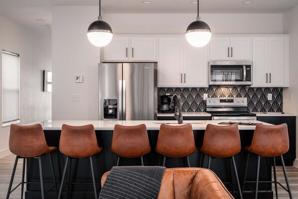 Full Kitchen and Extra Seating at the Bar