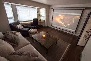Projector has HDMI hookup for personal computer streaming, or enjoy the Roku.