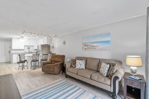 This comfy living room offers space for everyone to gather!