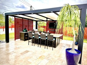 Gazebo area with grill and smart tv 