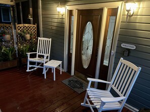 Front porch complete with rocking chairs 