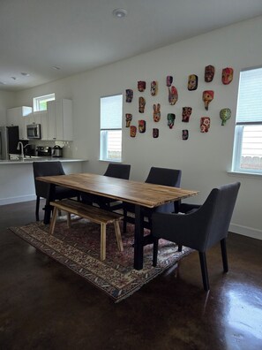 
Our spacious dining table is the perfect spot to connect with your loved ones.