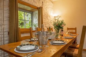Ground floor: Dining area with view out to the pretty gardens