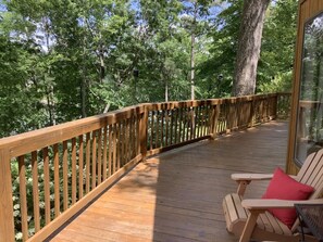 Lakeside deck with adirondack chairs - perfect spot to enjoy your morning coffee