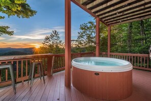 Relax in the hot tub with gorgeous mountain views