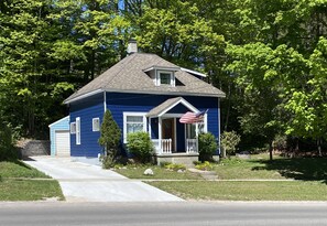 Front view with driveway