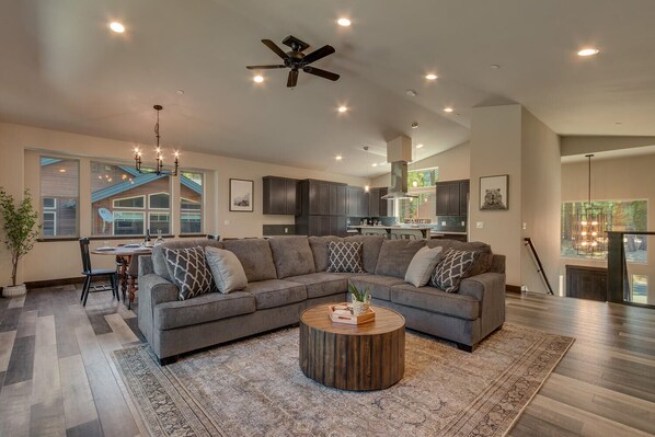 Living area with comfy sofa, fireplace, and flat screen tv