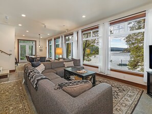 Living room with waterview - Relax in the living room of Horseshoe Bay House and enjoy the concrete heated floors throughout the main floor.