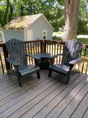 Relax, read a book,  and listen to nature on the back deck