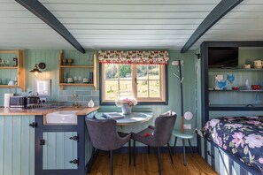 There is inside dining or 'al fresco' dining at the shepherd's hut.