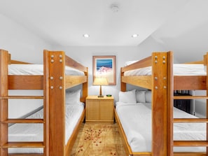 Bedroom 3 with 1 Queen Bed, 1 Twin-Over-Twin Bunk, and 1 Twin-Over-Full Bunk