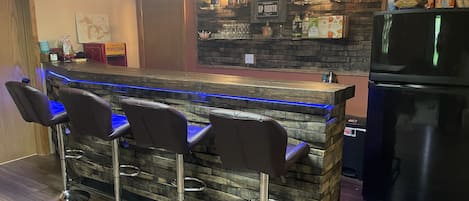 Owner built this beautiful whiskey barrel bar! 