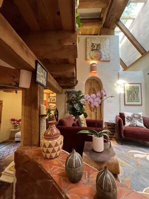 Living room and skylights with a bit of the den on the left