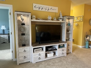 Living room with 60inch smart tv and Nintendo game system