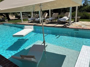 Remodeled salt water pool with new Baja Benches.