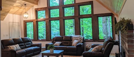 main living room with cathedral ceiling