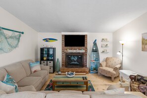 Plenty of space in this living room to gather and spend time together!