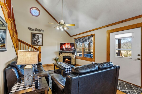 Beautiful farmhouse cabin with fireplace and view of hayfields