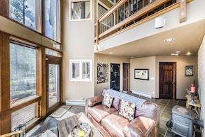 Living room - Gorgeous Atrium with beautiful and peaceful views located on the lower level