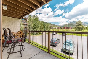 Private balcony with outdoor seating and incredible mountain views.