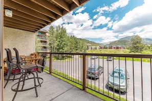 Private balcony with outdoor seating and incredible mountain views.