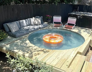 Cool off in our dipping pool. It is approximately 20" deep and 8 feet in diameter.