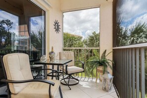 A third floor balcony to enjoy an evening beverage and people watch.
