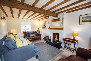 Enjoy snuggling up on the sofa in front of an open fire.