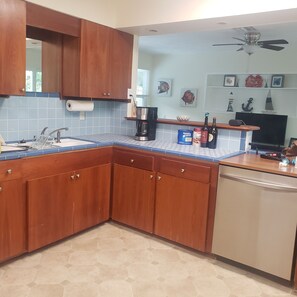 Kitchen overlooking living room.