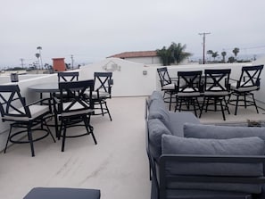 Killer large roof top patio with gas fireplace and BBQ
