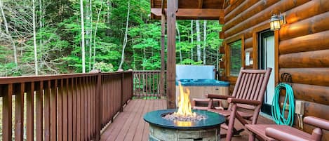 Front deck with hot tub, fire pit and sitting area



