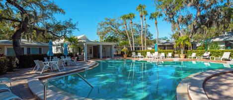 Old style pool with real 8' deep end. Plenty of chairs to lounge.