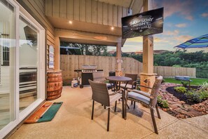 5 burner grill, lots of lighting to see what you're grilling, bistro table for 4