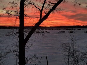 A beautiful sunset overlooking the ice fisherman on Green Lake