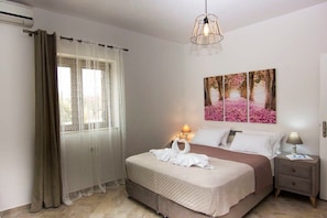 Relax in the comfort of the first bedroom with its inviting double bed