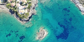 Experience the crystal-clear waters of Agios Dimitrios Beach, a mere 3.5km away