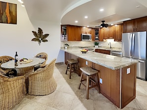 Open kitchen layout for the whole family to stay together while preparing meals.