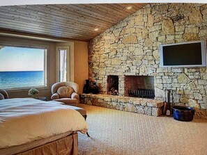Main Floor Master with sitting area.  Imagine waking up to that view!