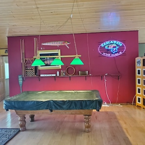 Pool table at entryside of Greatroom.
