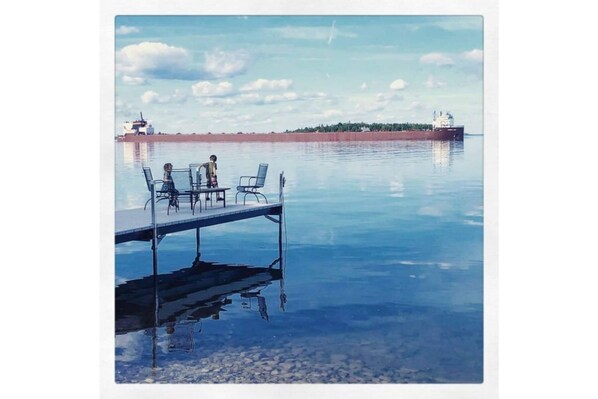 Guest Dock. Children whooed by passing freighter.