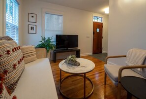 Living room with smart TV, WIFI throughout the whole home.