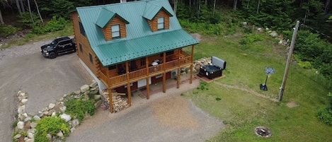 Drone view, firepit, hot tub and basketball hoop