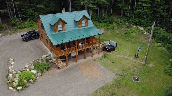 Drone view, firepit, hot tub and basketball hoop