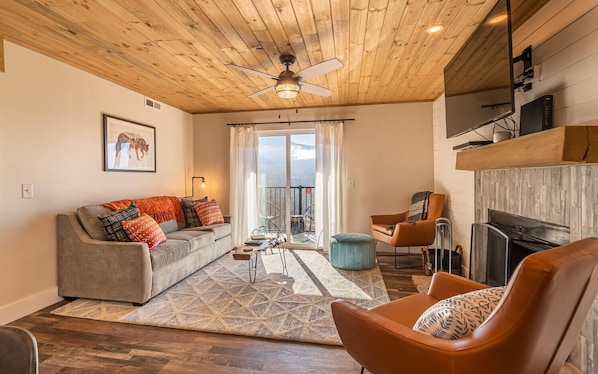The warm, inviting living room is ready for you and your crew to kick back and relax!