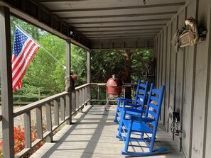 Ceramic Charcoal grill and a couple of rockers on the front porch. 