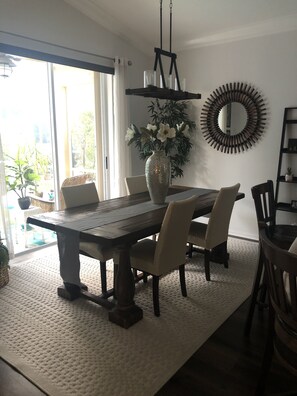 Formal dining room with patio door out to pool.