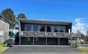 50' of parking with room for boat trailer.  Another 70' on the side of the house