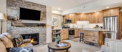 Living room with wood-burning fireplace